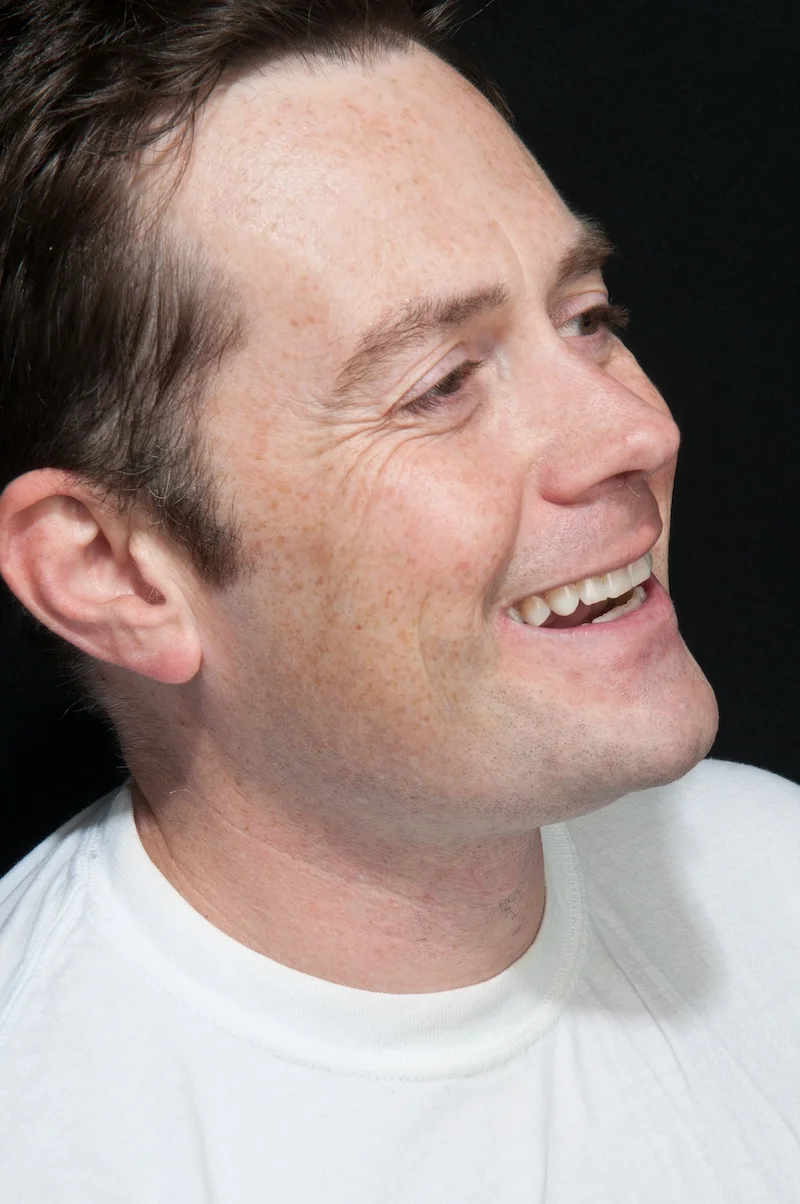 Headshot of Dave Wright smiling and looking to the right